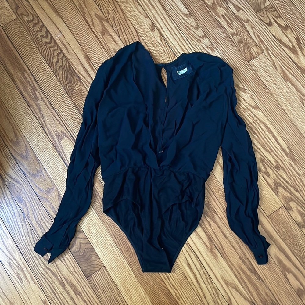 Black reformation size medium body suit